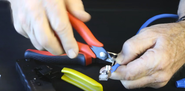 Roll drain wire into coil using needle nose pliers or similar