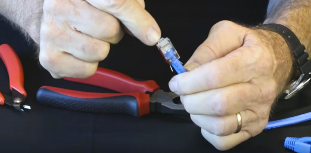 Insert prepped cable into the connector until copper conductors are seated at front of connector housing