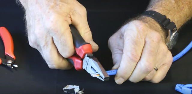 Carefully reshape the cable jacket using lineman's pliers or similar for easier insertion